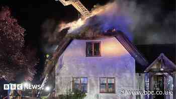 Swimming pool water used to tackle thatched roof fire