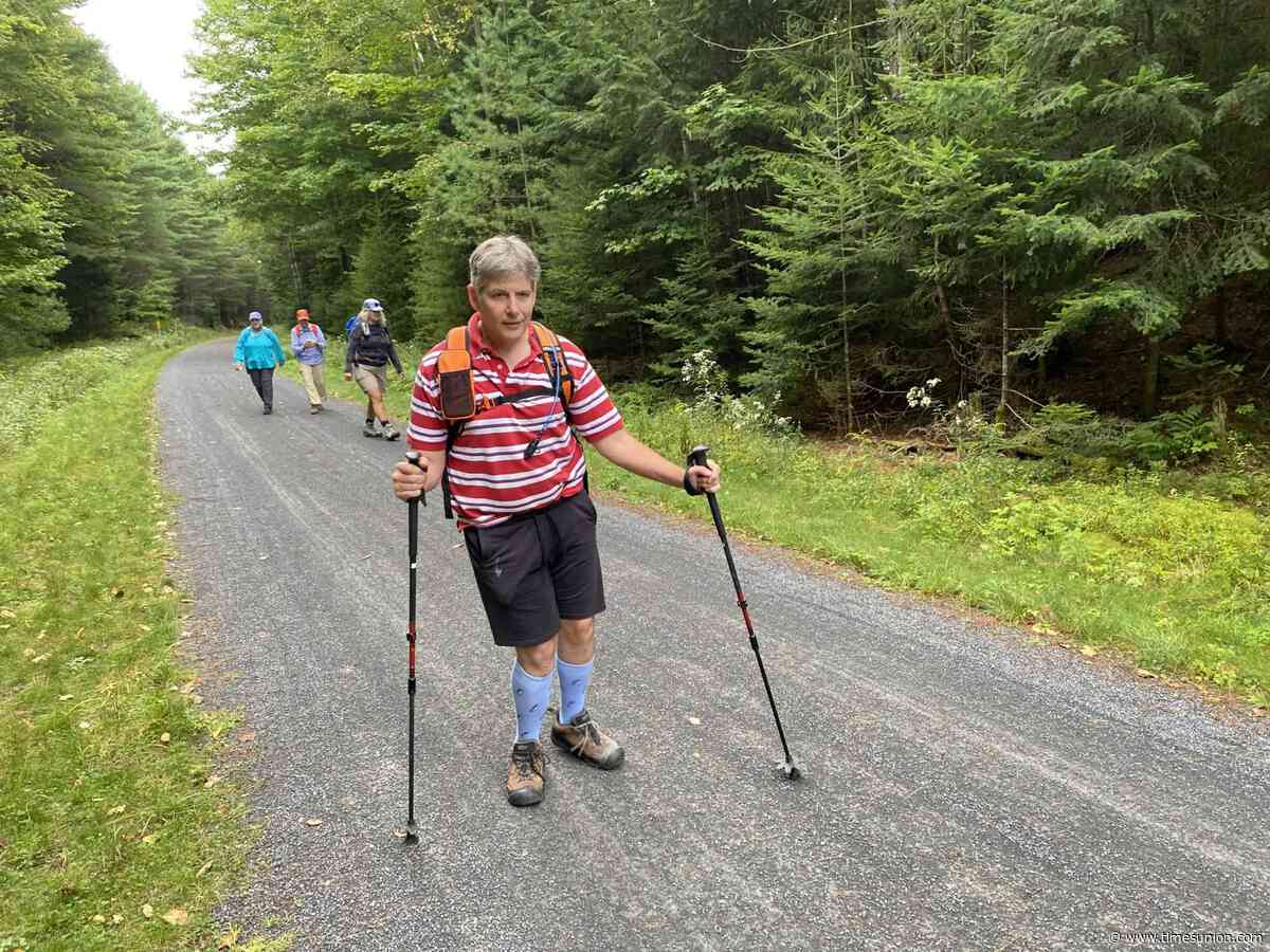 Saranac Lake man with cerebral palsy walks Adirondack Rail Trail