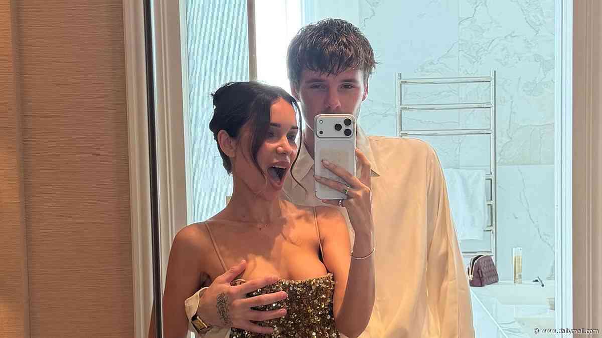 Cruz Beckham, 21, shares cheeky snap as he paws at girlfriend Jackie Apostel, 30, ahead of glam night out