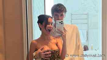 Cruz Beckham, 21, shares cheeky snap as he paws at girlfriend Jackie Apostel, 30, ahead of glam night out