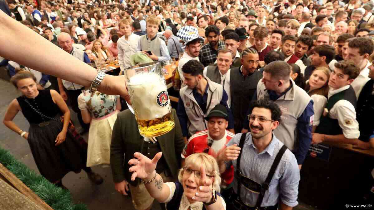 O‘zapft is! Fotos zeigen ausgelassene Stimmung nach erfolgreichem Wiesn-Anstich