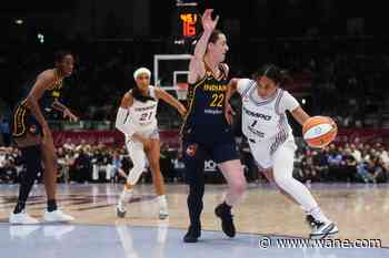 Fever's Mitchell surprised by postgame party after setting WNBA scoring record in win at Toronto