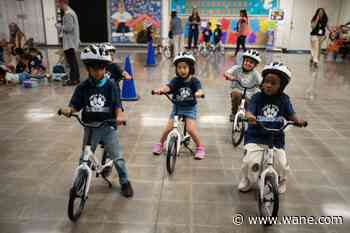 Childhood rite moves indoors as kindergartners learn to ride bikes in school gyms