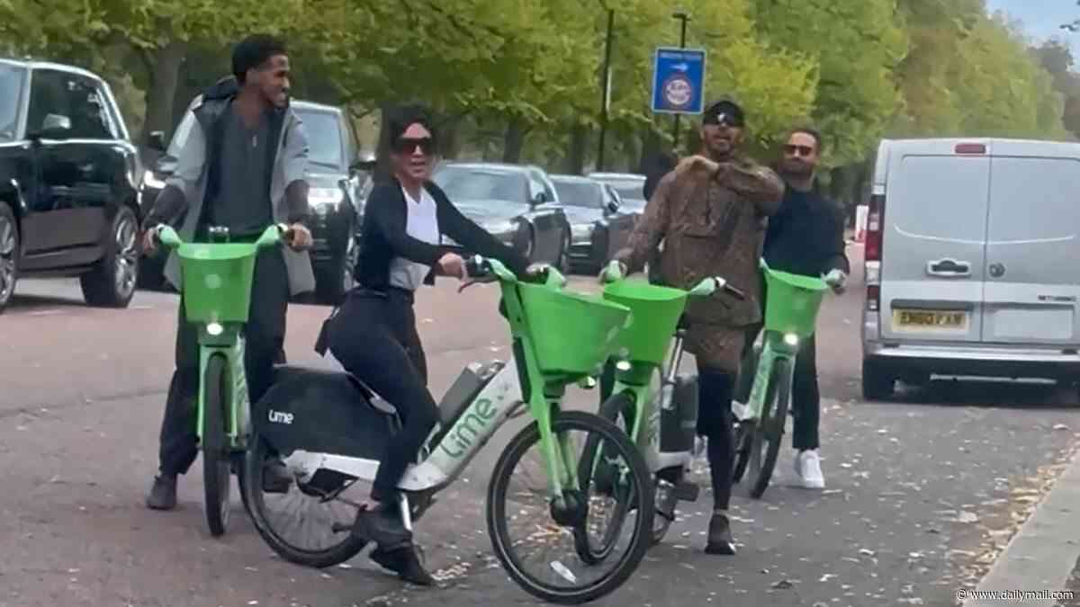 Kim Kardashian and boyfriend Lewis Hamilton explore London on Lime bikes before having a British afternoon tea during romantic day in the city