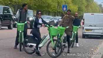 Kim Kardashian and boyfriend Lewis Hamilton explore London on Lime bikes before having a British afternoon tea during romantic day in the city