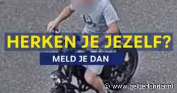 Boze fatbiker achtervolgt auto bij KFC in Apeldoorn en gooit steen door de ruit