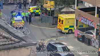 Northern Quarter police scene LIVE as air ambulance lands with street shut off