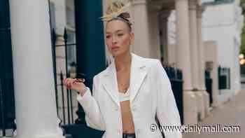 Roxy Horner commands attention in an ab-flashing bralette and white coat before stepping out with mini-me daughter Elsie, 3, for London Fashion Week