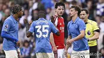 Declan Rice loses his cool as Arsenal are thumped by Brighton: Frustrated Gunners star AVOIDS red card despite appearing to kick out at Malick Yalcouye as reason why he was not sent off is revealed