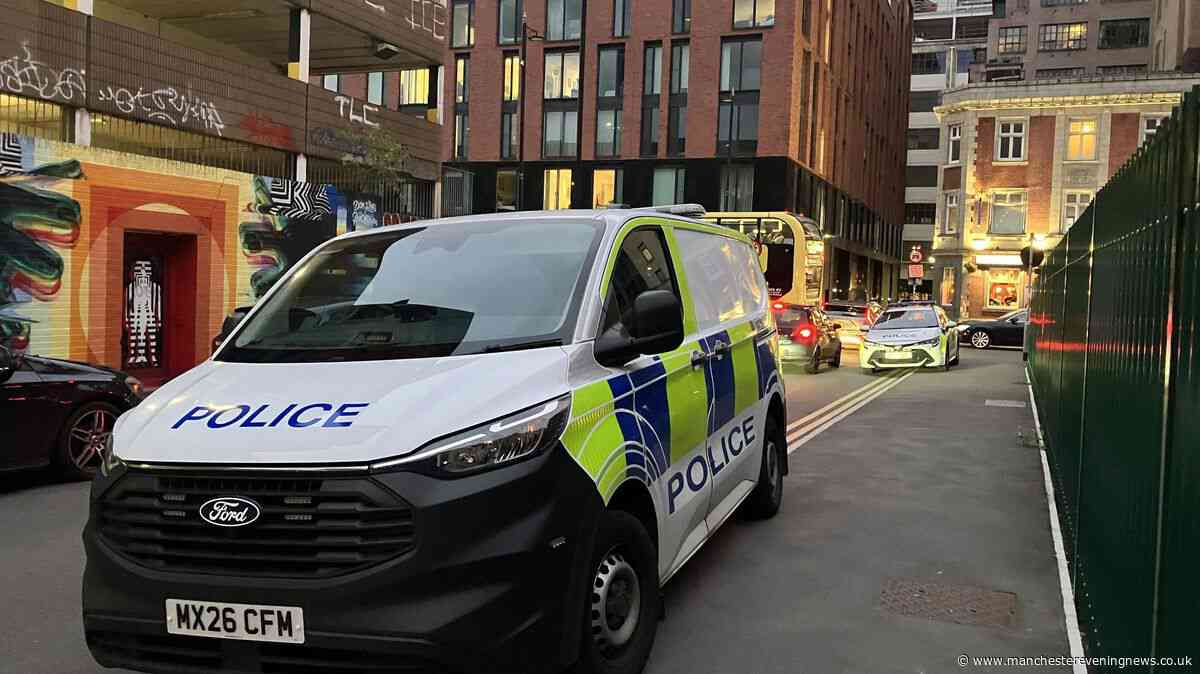 Northern Quarter police scene as air ambulance lands with street shut off