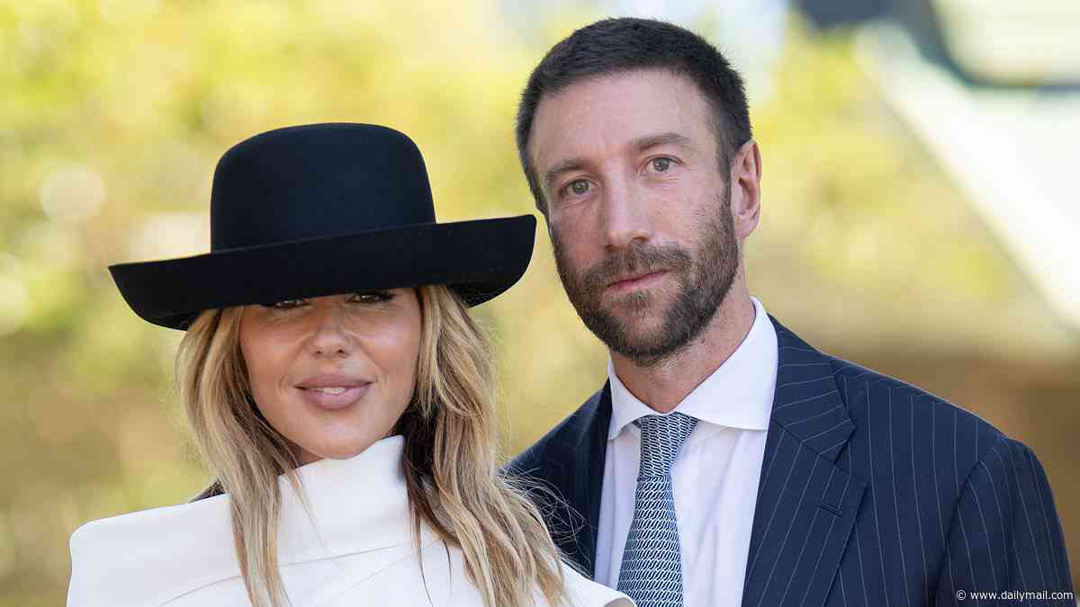 Pip Edwards and her new boyfriend Nicholas Nogarotto turn heads in monochromatic elegance at Royal Randwick's Surf to Turf Day in Sydney
