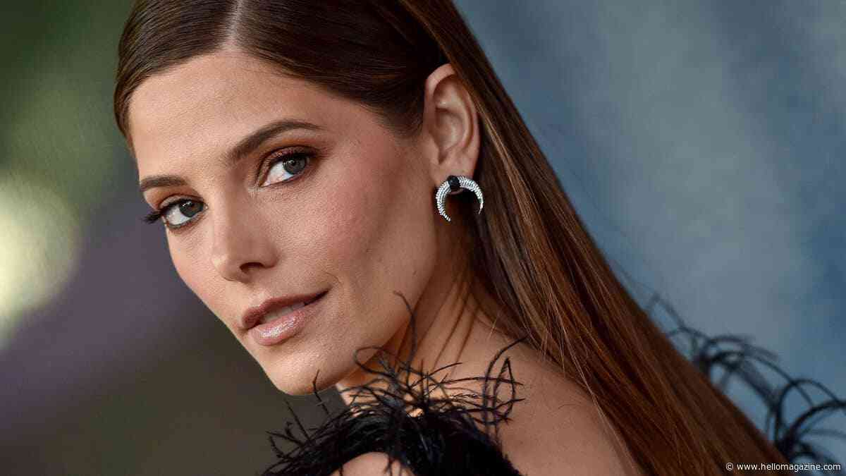 Twilight star Ashley Greene raises the temperature in tiny navy blue bikini in new lakeside photos