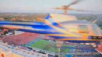 Wild moment helicopter narrowly avoids mid-air collision with drone over Ole Miss-LSU game