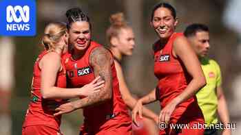 Suns surge to victory, Tigers survive Giants comeback in AFLW