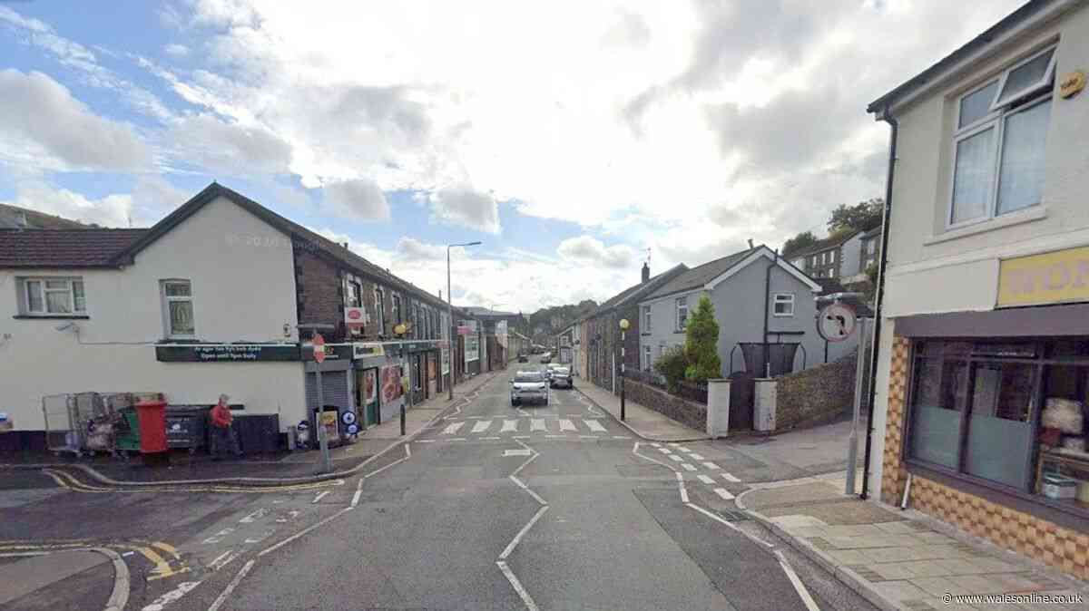 Man arrested after car crashes into property in Porth