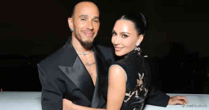 Kim Kardashian and Lewis Hamilton share first public kiss and we are not ok