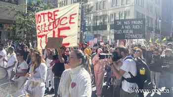 Activists march in Montreal to demand action to end violence against women