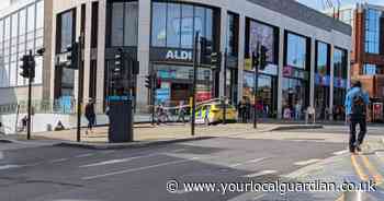 Pictures from the scene as police tape off area after Wimbledon traffic collision