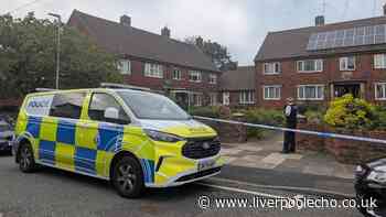 Man stabbed in 'targeted attack' as police cordon off Prescot flats