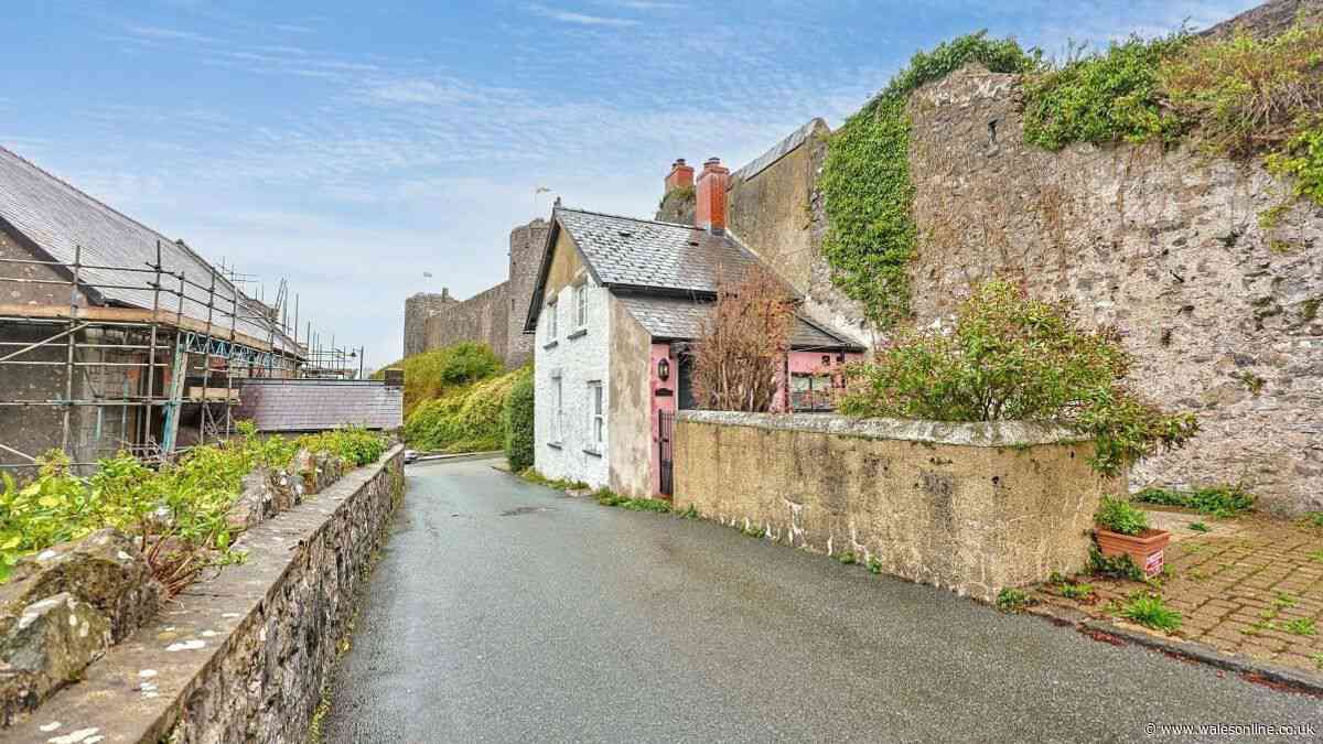 The £89k cottage joined to an ancient town wall with a castle as its neighbour
