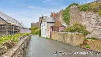 The £89k cottage joined to an ancient town wall with a castle as its neighbour