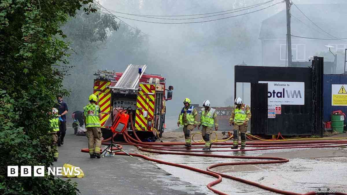 Explosions warning as vehicles involved in scrapyard fire