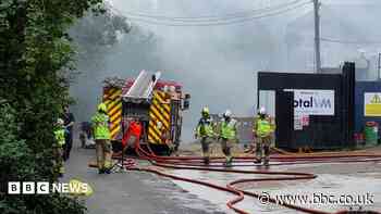 Explosions warning as vehicles involved in scrapyard fire