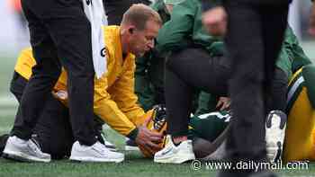 Packers have two stars carted off in four plays against Jets as star receiver is put on backboard in worrying scenes