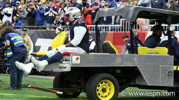 Patriots starting RG Onwenu carted off with ankle injury