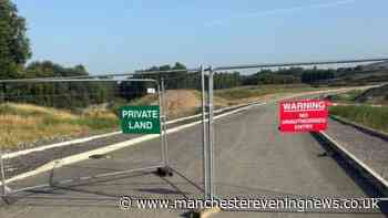 Claims a developer’s failure to pay £1,200 legal fee is holding up opening of ‘vital’ £19m link road