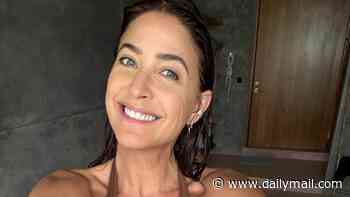 Lisa Snowdon, 54, shows off her incredible figure as she poses in her bikini in the shower on trip to Sri Lanka after split from fiancé George Smart