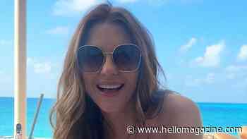 Elizabeth Hurley, 61, turns heads in a peach bikini as she soaks up the California sunshine
