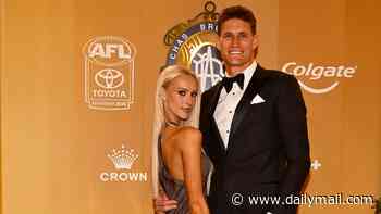 Rory Lobb's fiancé Lexi Mary stuns in flowing feather gown as she leads the glamorous WAG arrivals at 2026 Brownlow