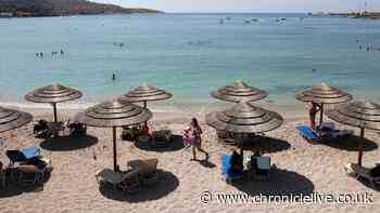 Beach 'fight over sun lounger' leaves 82-year-old man dead as two people arrested