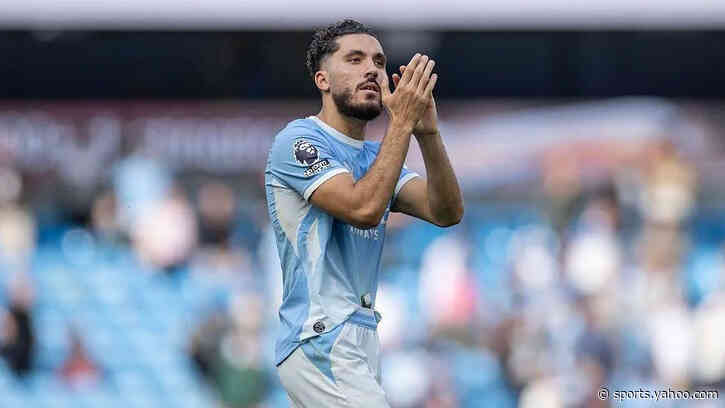 Man City put pressure on Arsenal but face stern examination after break