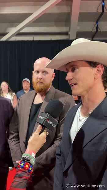 CCMA Awards hosts James Barker Band reflects on Dolly Parton's impact while walking the red carpet.