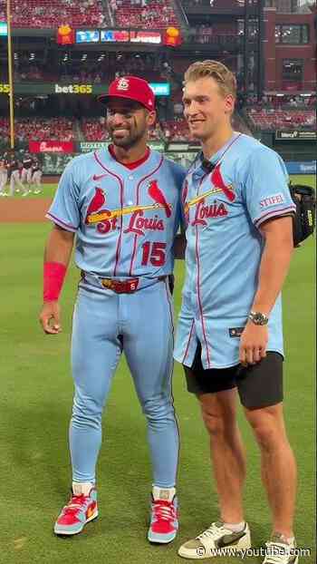 Holloway throws out first pitch