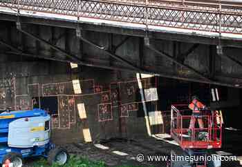 Workers take first step to raze Central Warehouse after long process