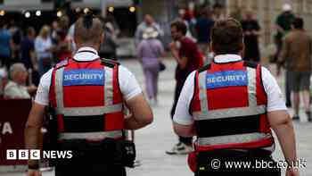 Handshakes, heckles and a row over security patrols near asylum base
