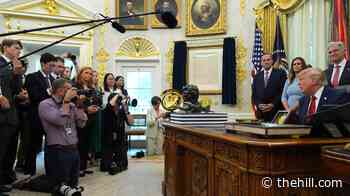 Trump floods the zone with press ban, triumphal arch, Kennedy Center