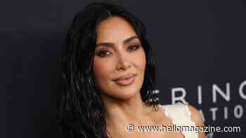 Kim Kardashian poses nude beneath florals in striking new pictures