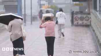 Typhoon Dujuan tracking close to Tokyo triggers rare evacuation alert