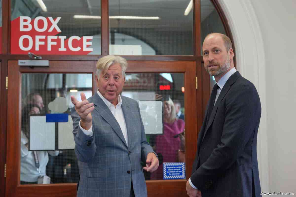William ignores question about Diana book as he serves popcorn on cinema visit