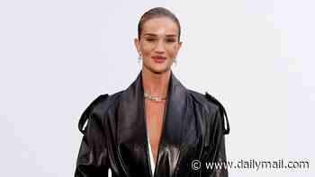 Rosie Huntington-Whiteley wows in a sexy leather trench coat as she joins leggy Lila Moss and Jodie Turner-Smith at London Fashion Week's star-studded Burberry show
