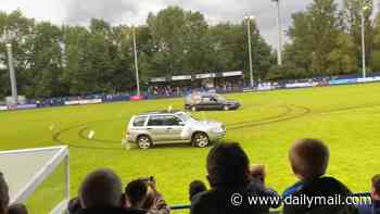 Five men charged over driving a HEARSE onto football pitch - after stunt caused non-league match to be abandoned