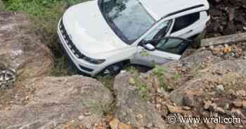 1 rescued after SUV plunges down embankment at bottom of North Carolina waterfall