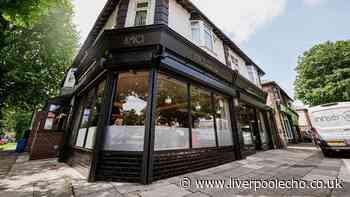 Liverpool FC player stopped to take photos with staff in Aigburth restaurant