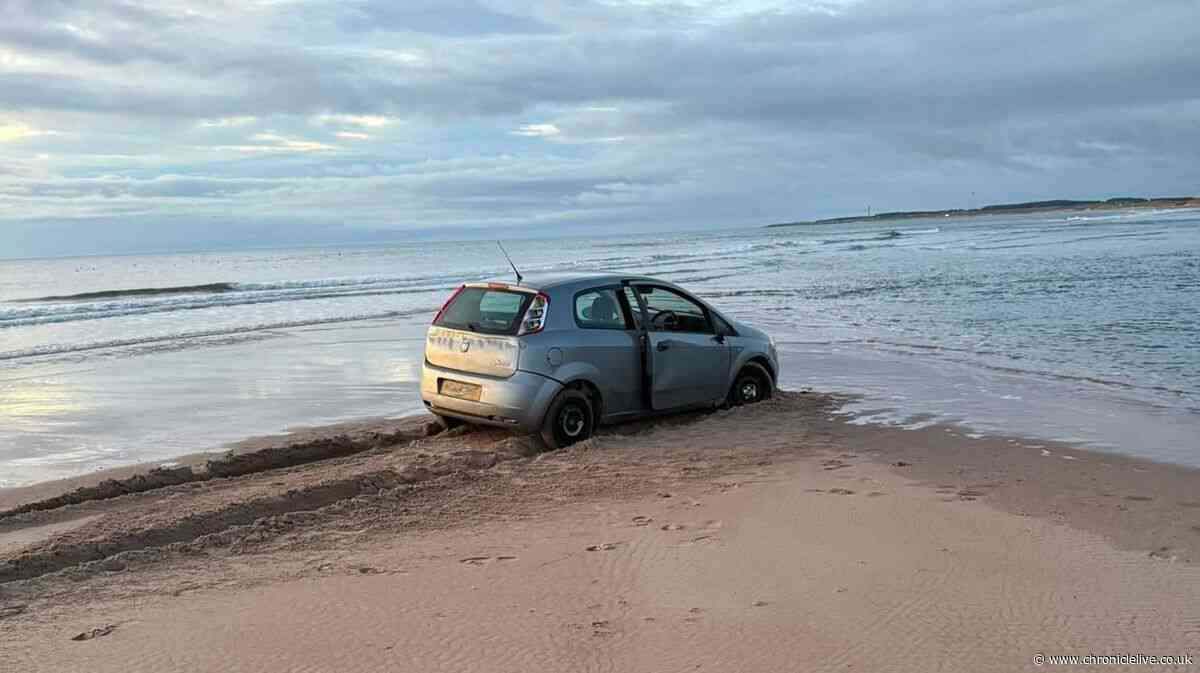 Anger as abandoned car remains on Northumberland beach after four days