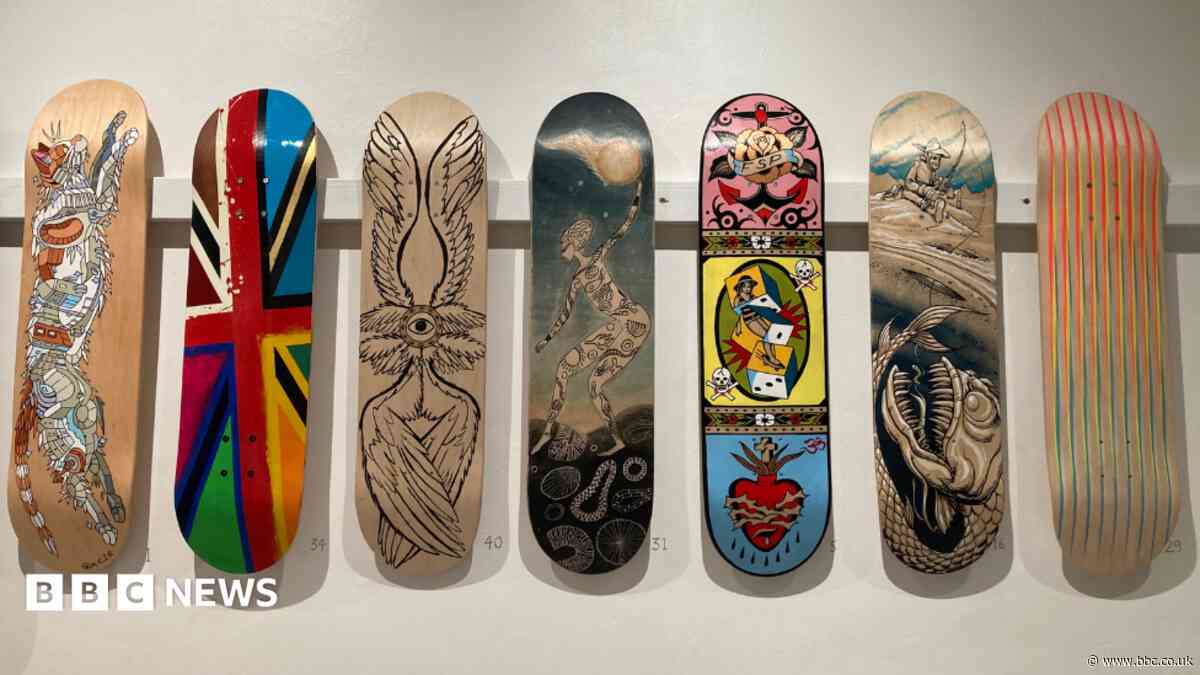 Artists paint boards to raise money for skate park