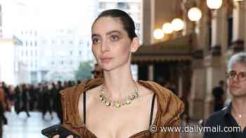 Paul Walker's daughter Meadow, 27, unveils a high-fashion new look as she flashes her abs in an unusual bra top at Vogue World